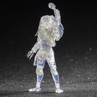 Clear plastic figure of a character on a dark background