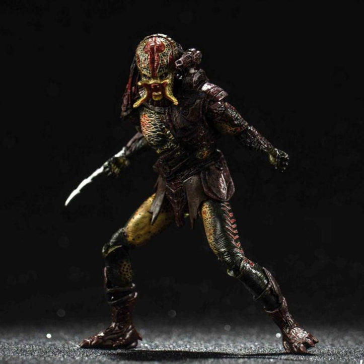 Action figure of the Predator with a dark background