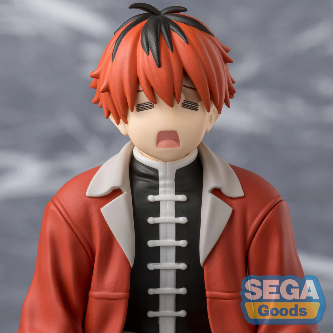 Figurine of Stark with red hair and wearing a red jacket, featuring the Sega Goods logo. - Action Figures - Anime