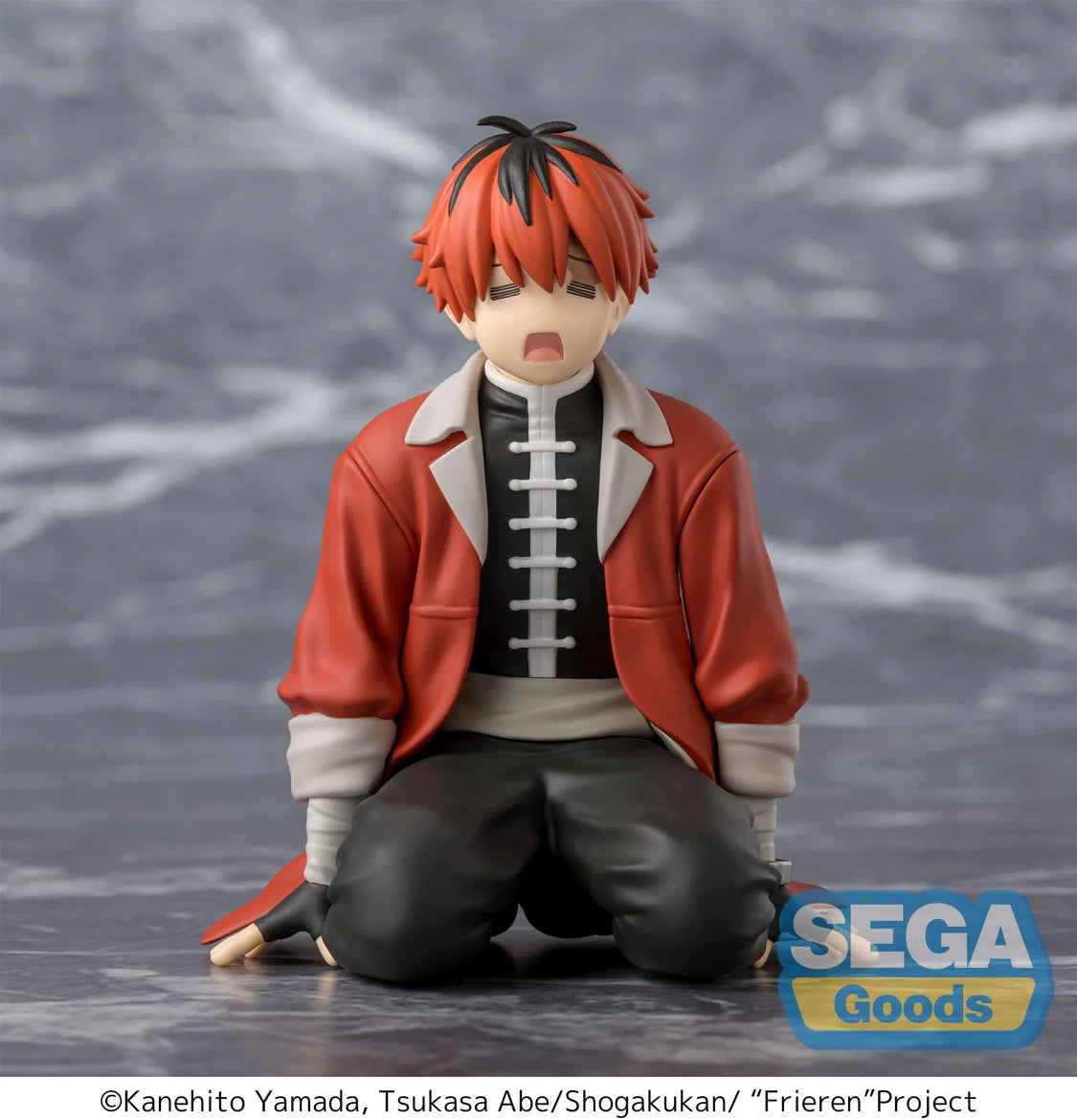 Figurine of a character from 'Frieren' Project with red hair and a red jacket on a gray background, featuring Sega Goods branding. - Action Figures - Anime