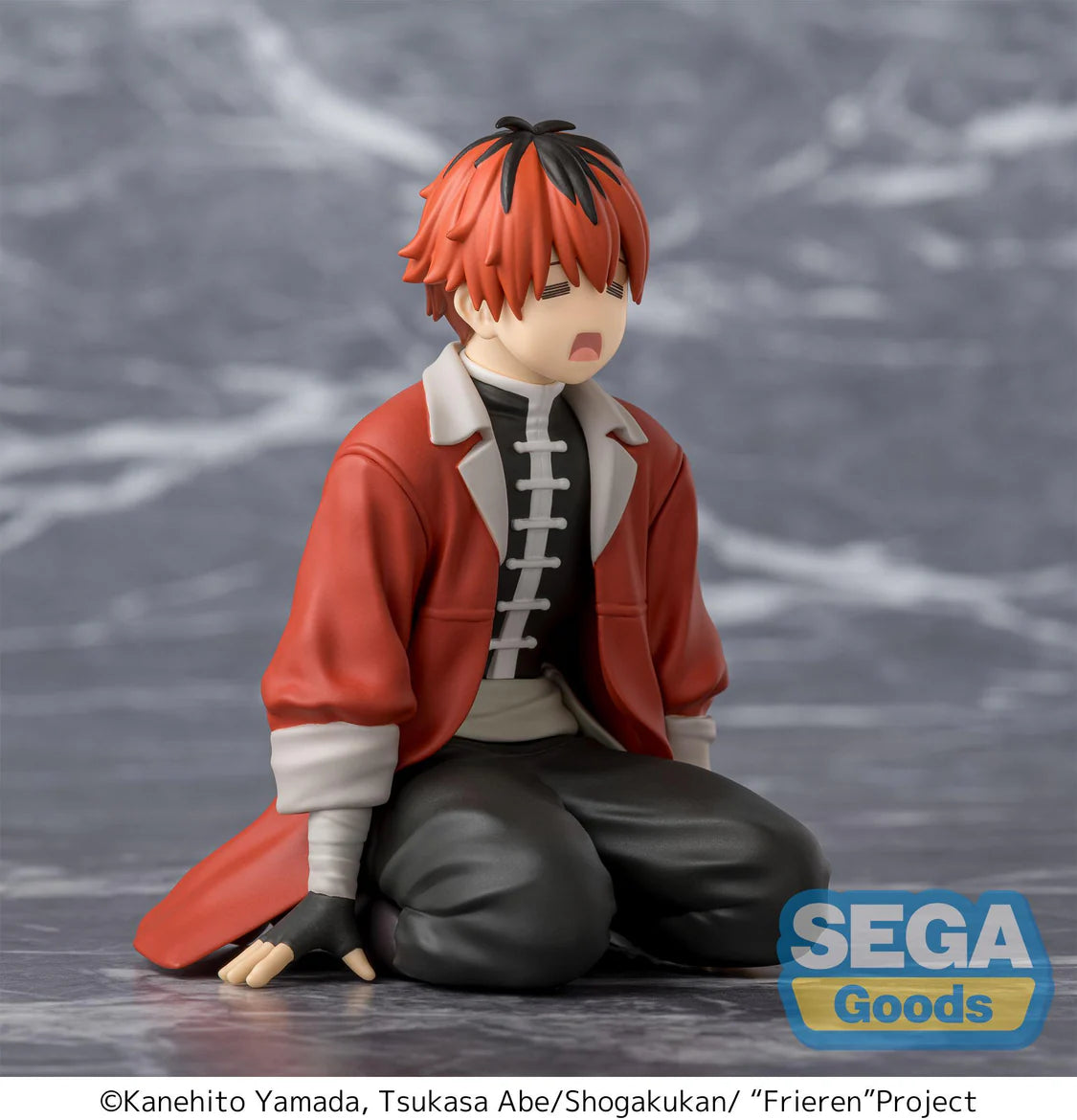 Figurine of a character from 'Frieren' Project with red hair and red coat on a gray background, featuring Sega Goods logo. - Action Figures - Anime