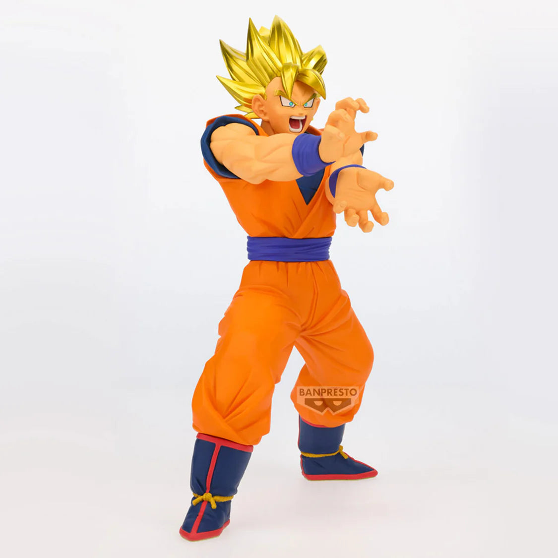 Goku Action figure in orange and blue outfit with 'Banpresto' branding on a white background - Statues