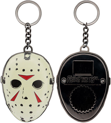 Keychain with Jason Voorhees mask design on one side and black surface with circular cutout on the other, featuring 'Friday the 13th' branding.