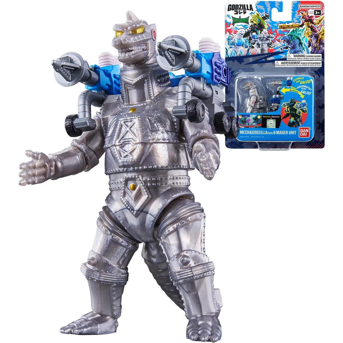 A silver armored MechaGodzilla action figure . The figure has metallic silver body armor, blue shoulder-mounted weapon elements, and small yellow eyes.