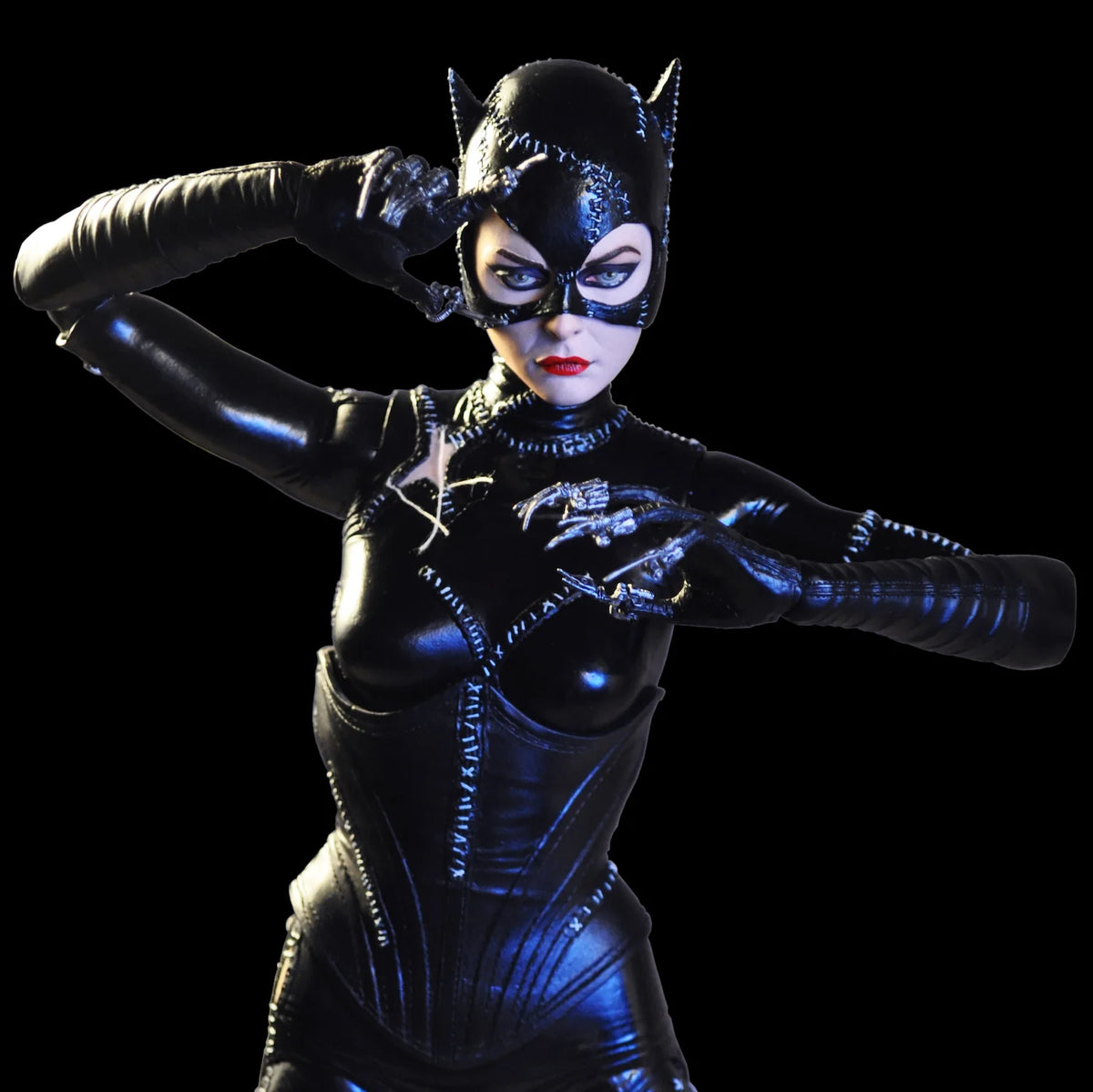 Catwoman action figure with a mask on a black background - Action Figures - DC Comics