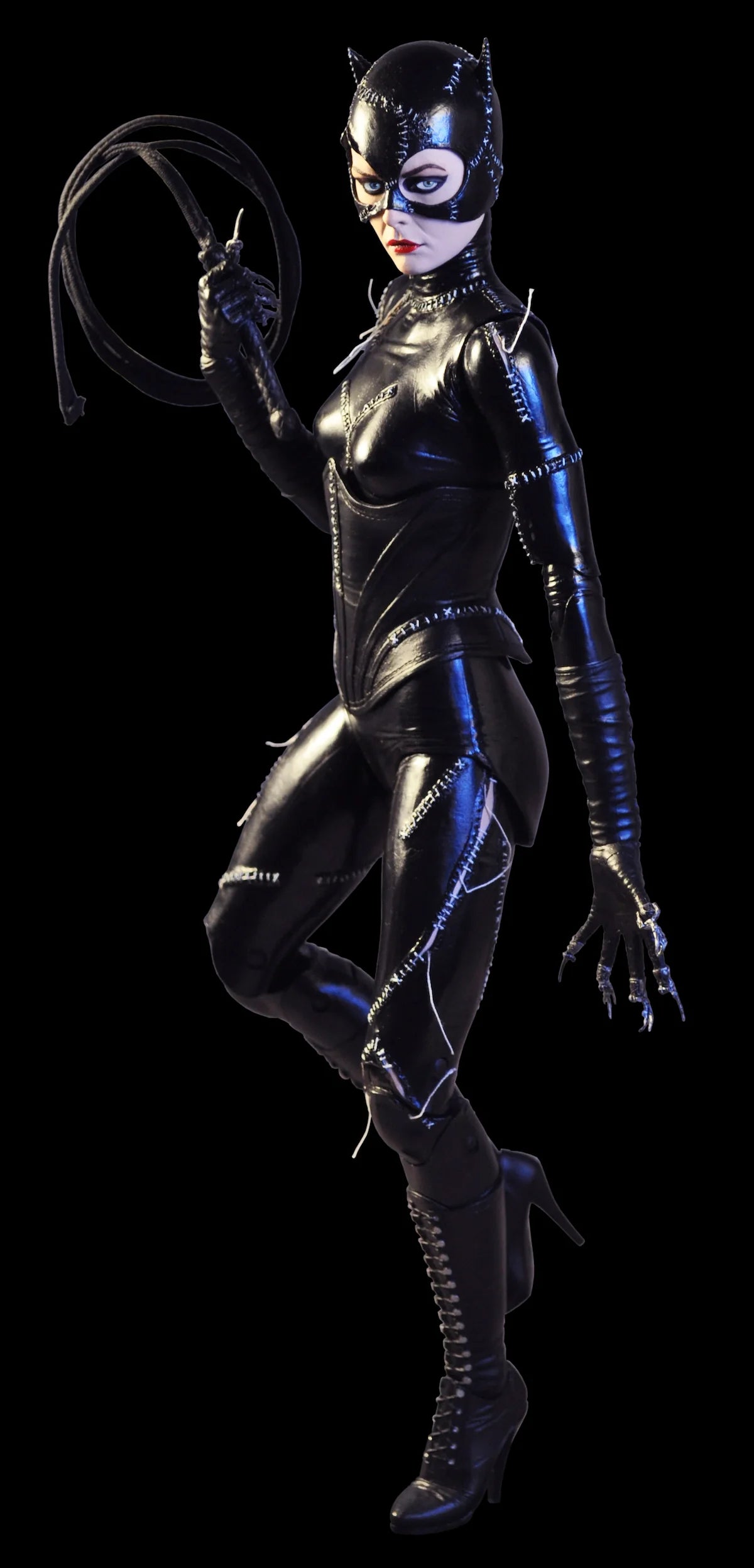 Catwoman figure in black costume with cowl and whip on a transparent background - Action Figures - DC Comics