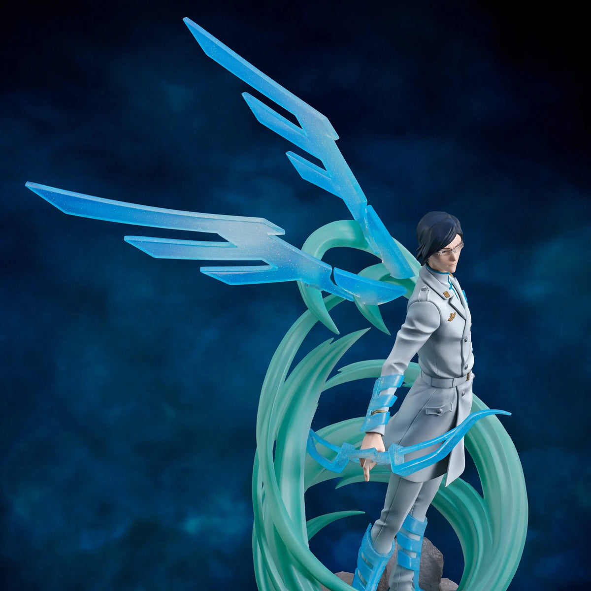 Statue of a character with blue and green wings against a dark blue background