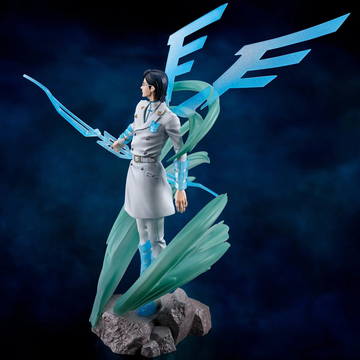 Figurine of a character with blue energy and wings against a dark background