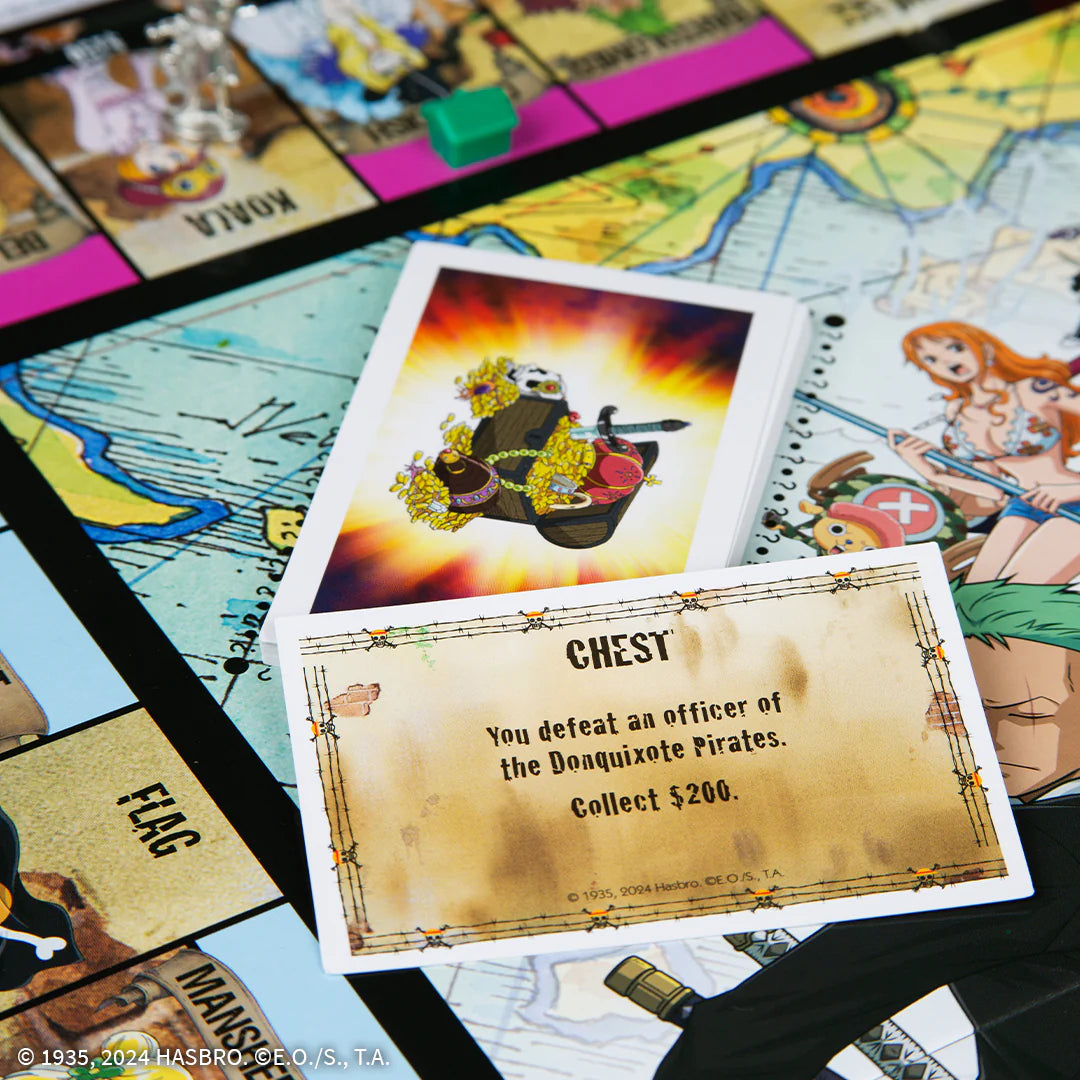 Board game cards with colorful illustrations and text on a game board