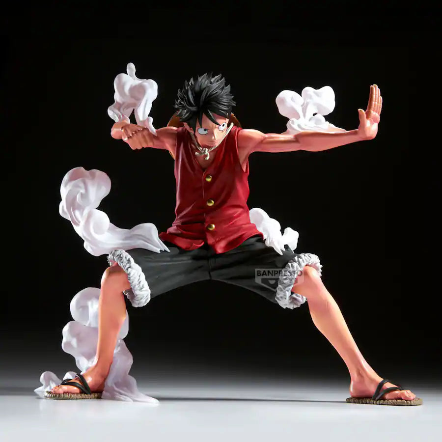 Action figure of Monkey D. Luffy in a dynamic pose with white clouds around, on a black background - Action Figures - Anime - One Piece