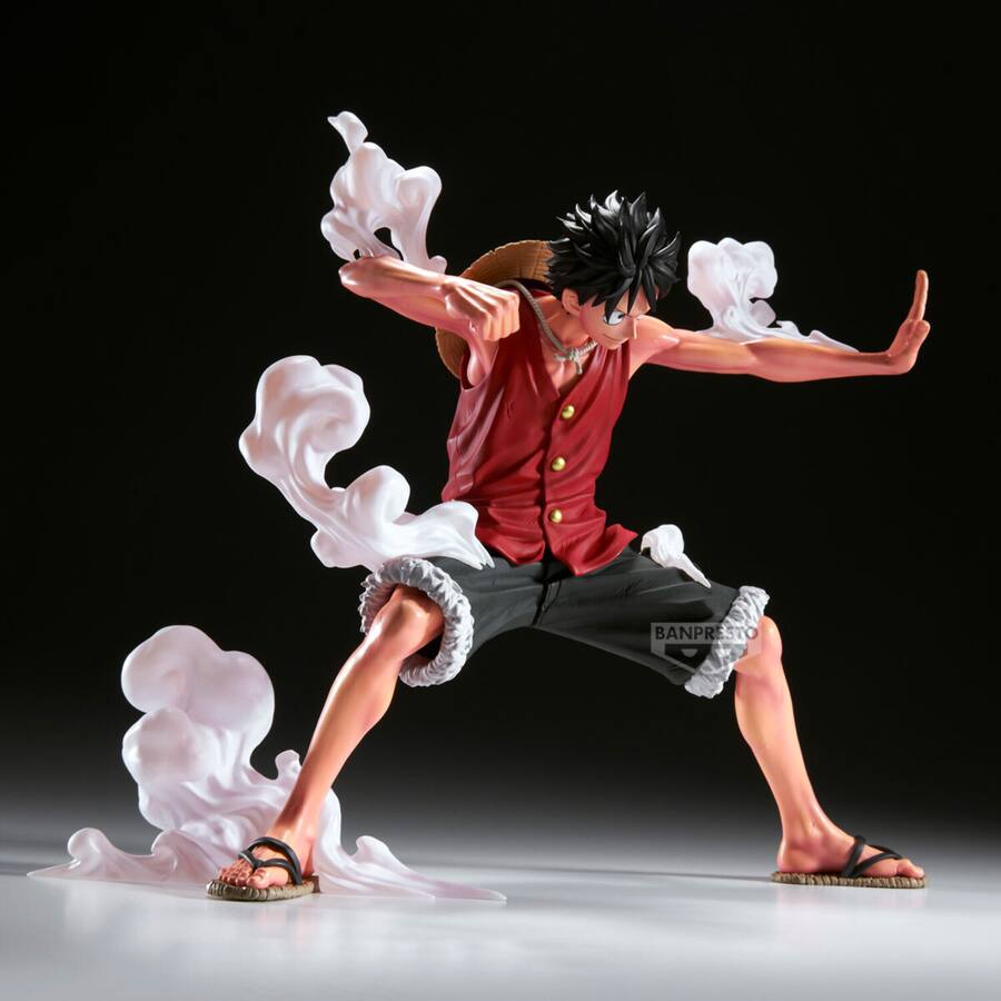 Action figure of Monkey D. Luffy in a dynamic pose with smoke effects on a dark background - Action Figures - Anime - One Piece