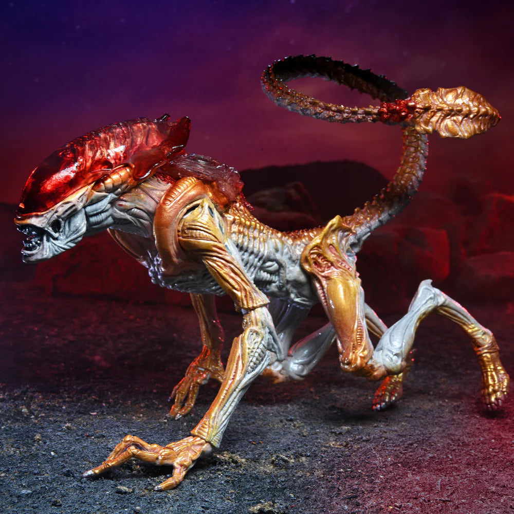 Dinosaur-like creature model with red and gold colors on a dark background