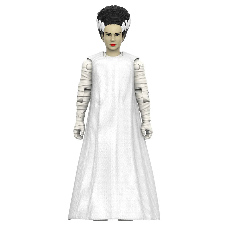 A collectible action figure of a woman with short dark hair, wearing a long white dress and white arm wraps. - Action Figures - Horror