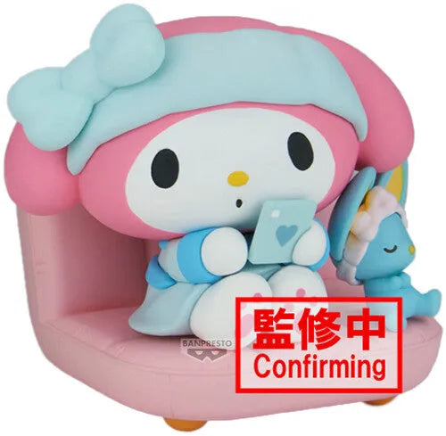 My Melody Relaxing Time at Home figure holding a blue heart-decorated book with Flat sleeping beside her.