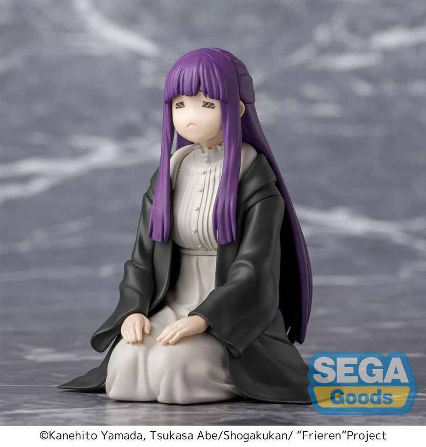 Figurine of Fern with purple hair and black and white outfit on a gray background, featuring SEGA Goods logo.