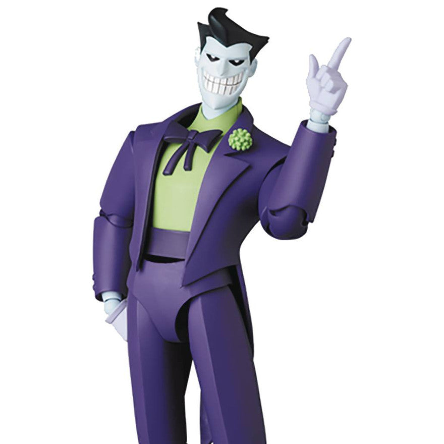Action figure of The Joker in a purple suit on a white background