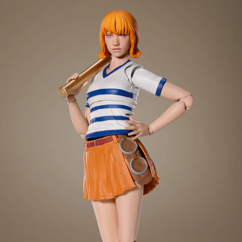 Figure of a character with orange hair and a striped shirt holding a baseball bat on a brown background