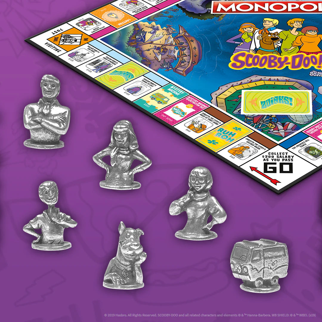 Monopoly Scooby-Doo board game set with a colorful game board and six silver metal character and vehicle pawns displayed on a purple background. - Games - Board Games - Monopoly