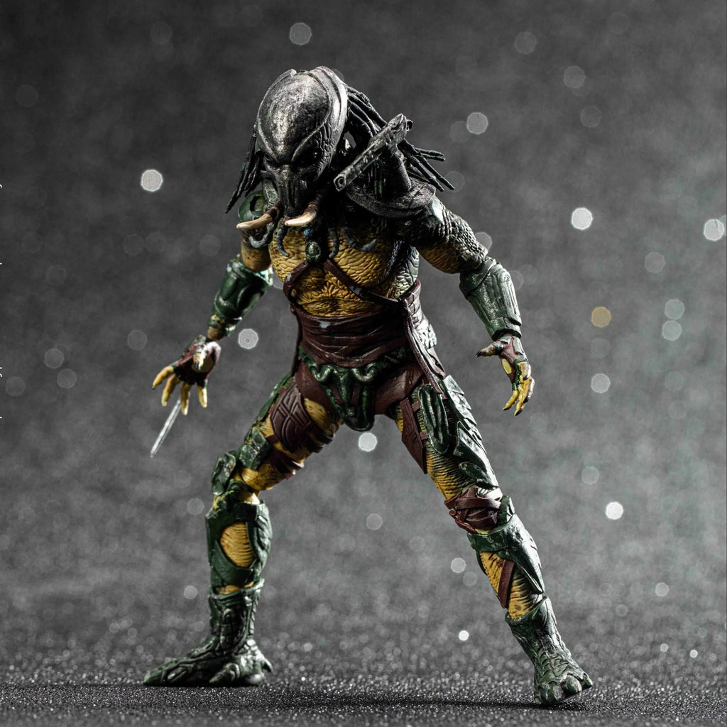 Predator action figure on a dark background