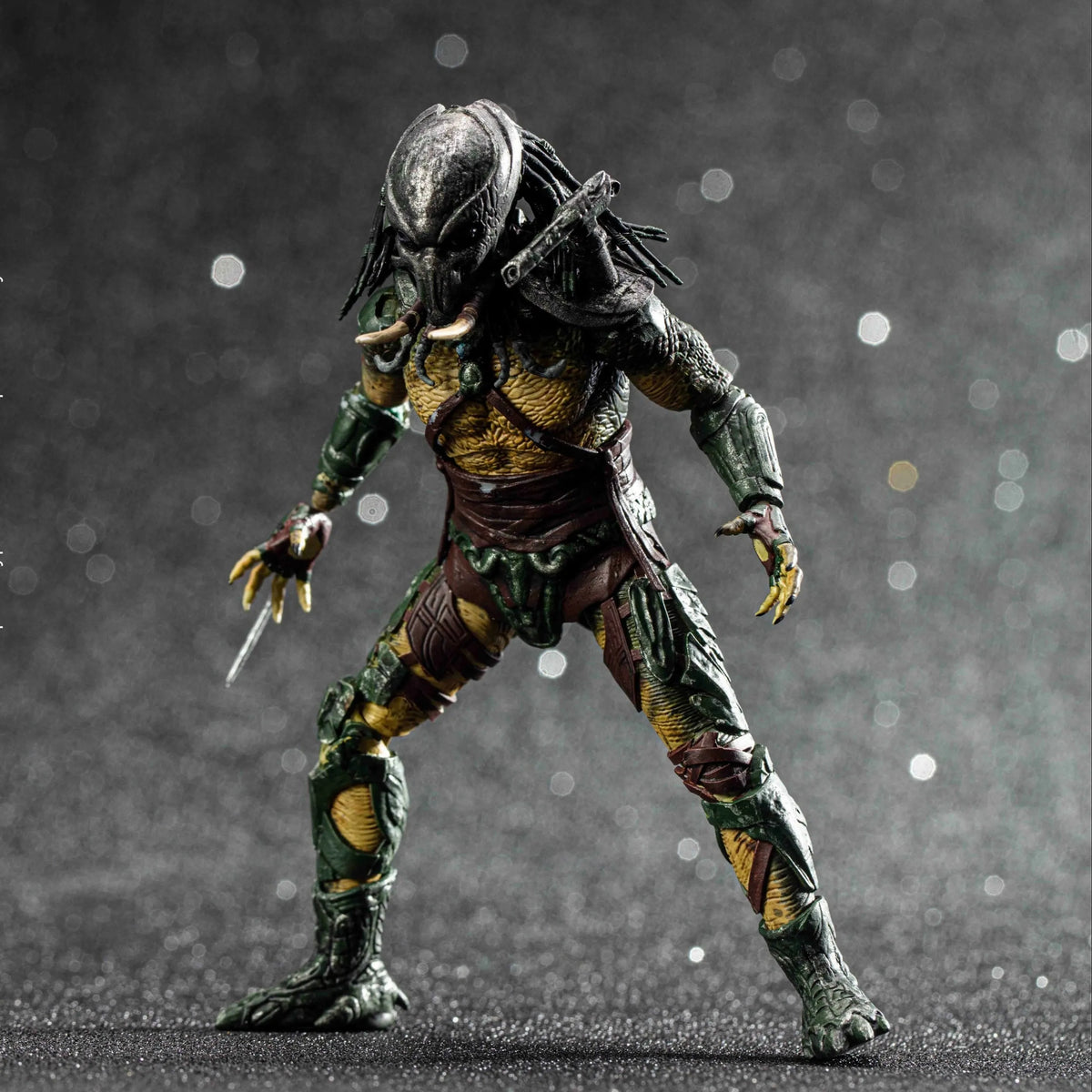 Predator action figure on a dark background - Toys