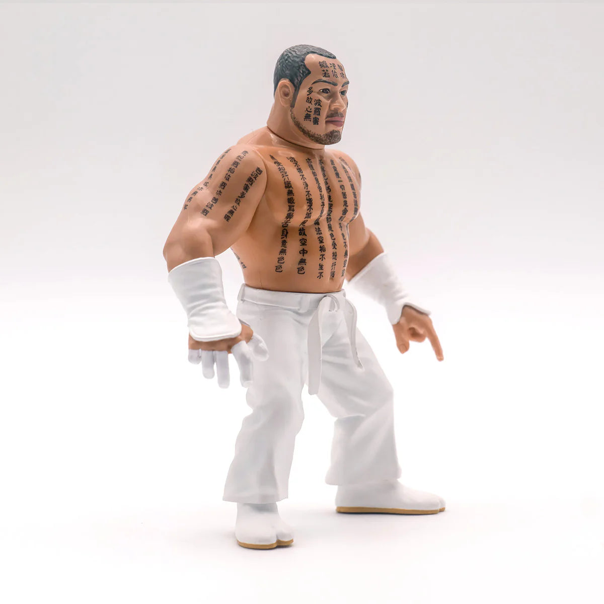 Jinsei Shinzaki action figure displaying detailed markings across the face, chest, arms, and back. - Action Figures - Wrestling