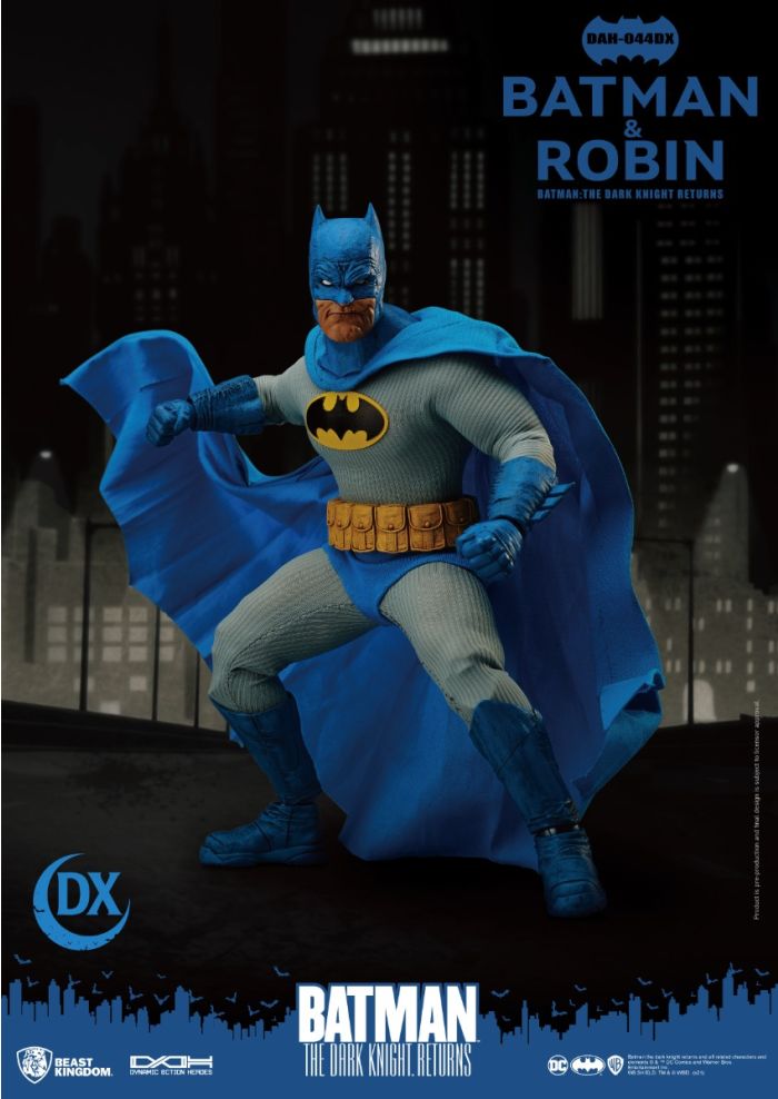 Batman action figure with cape against a cityscape background - Action Figures - DC Comics