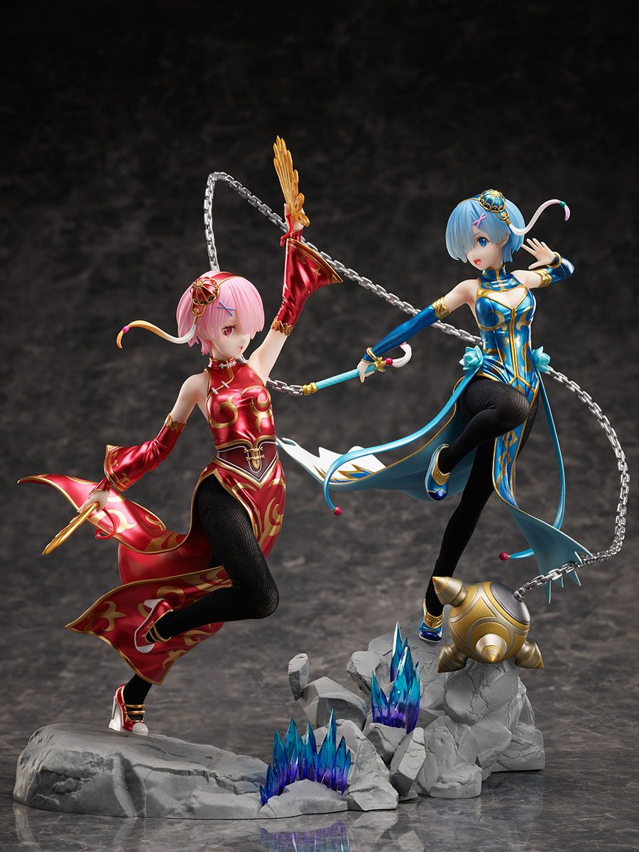 Two animated character figurines on a dark textured background - Statues - Anime