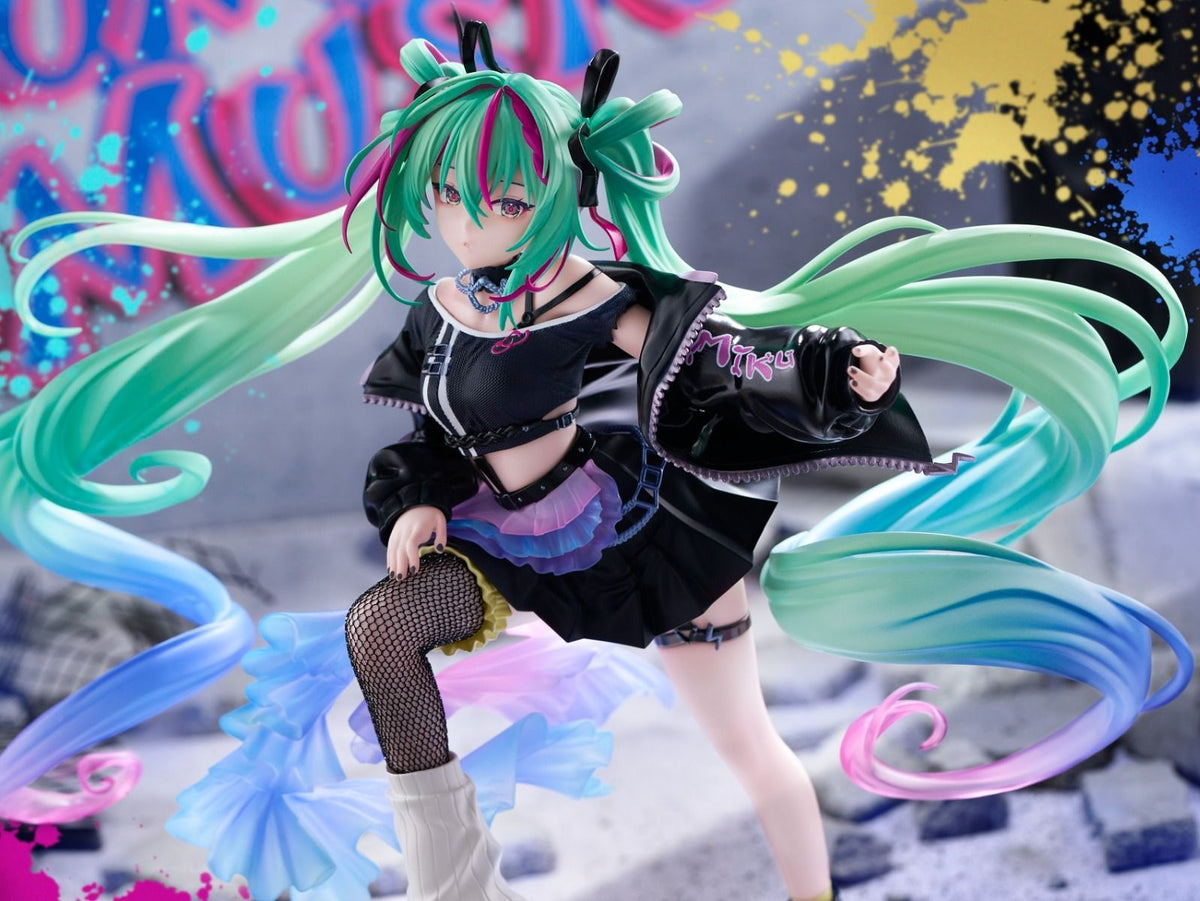 Hatsune Miku figurine with green and blue hair in a dynamic pose against a colorful background. - Statues