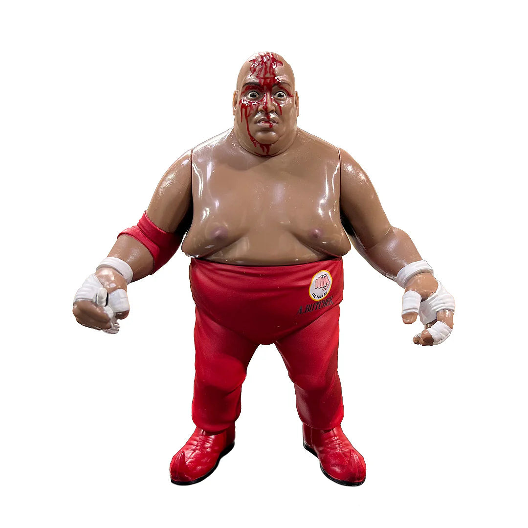 Wrestling figure of Abdullah the Butcher in red pants