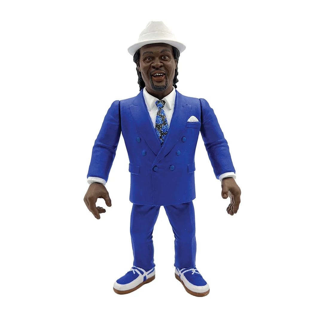 Action figure of Slick in a blue suit with a white hat. - Action Figures - Wrestling